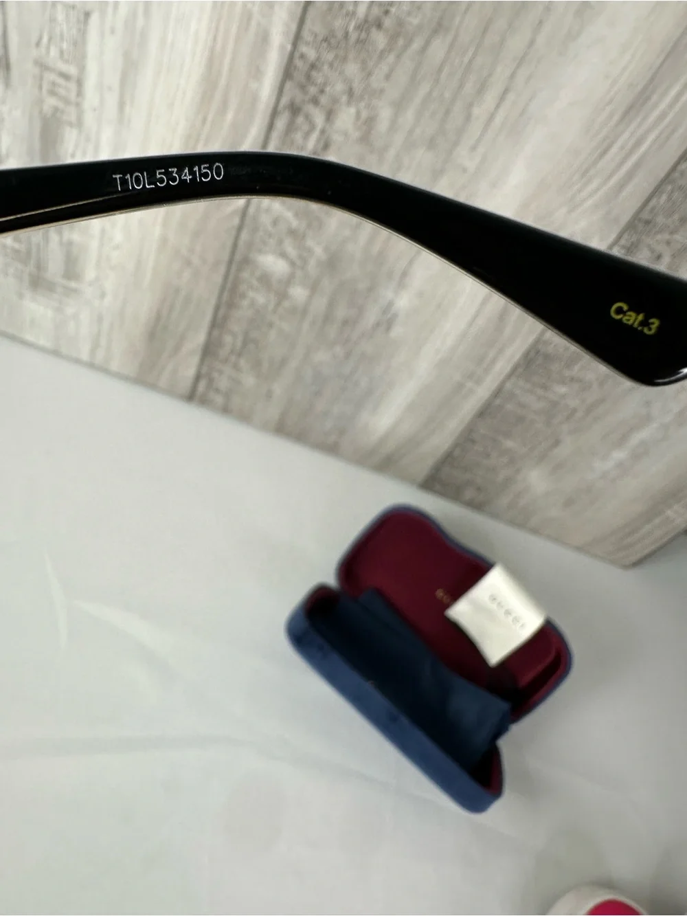 Gucci Men’s Black Lens Sunglasses with Gold Frame